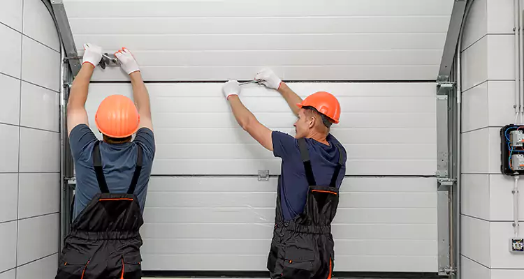 Garage Door Bottom Panel Repair in Vero Beach South, FL